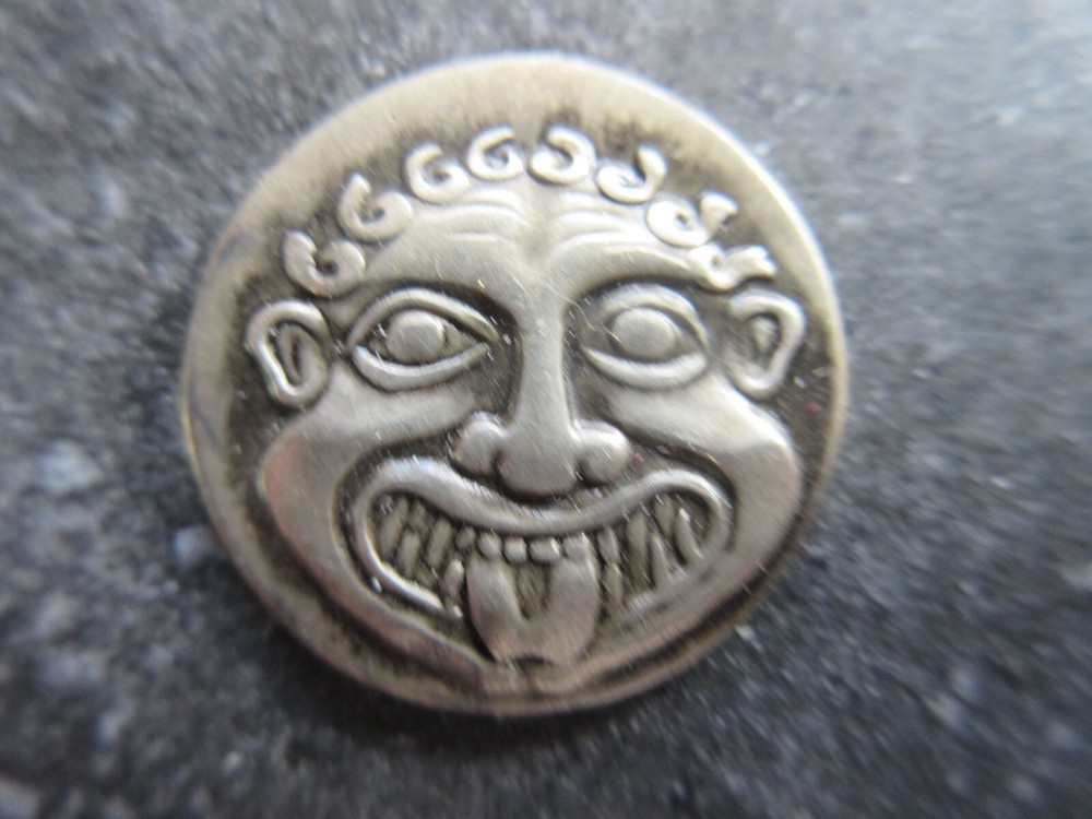 Unknown High Relief Face Token