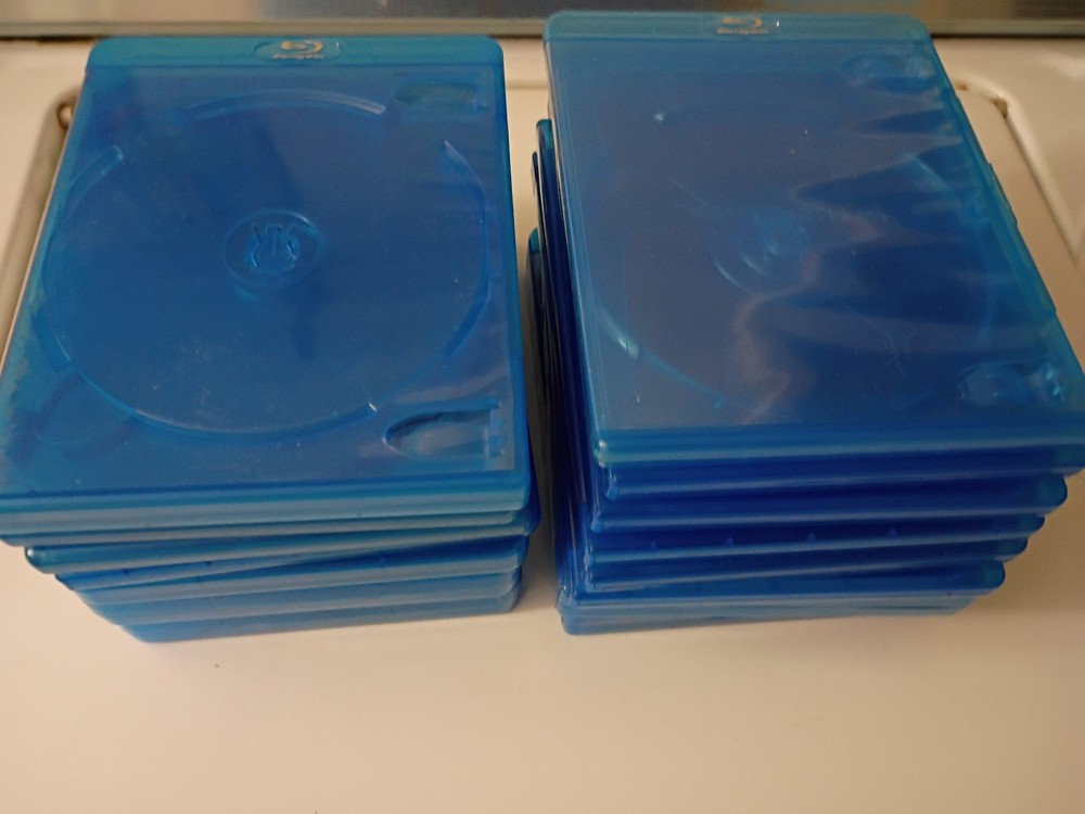 (12) ASSORTED BLU-RAY- DVD CASES. "asstd sizes"