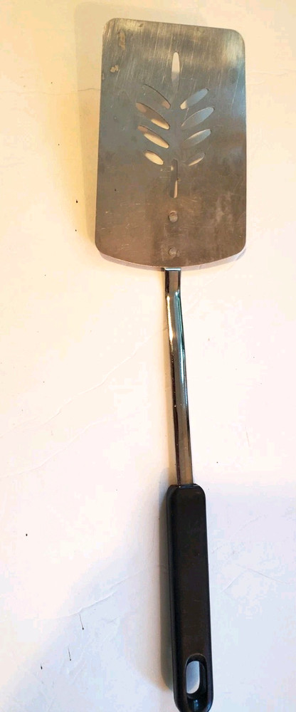 slotted spatula, black composite handle, 13" long, in good shape