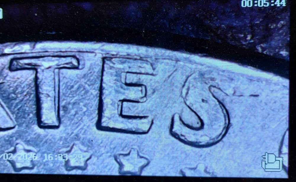 1973 d kennedy half dollar coin with DDO error on back