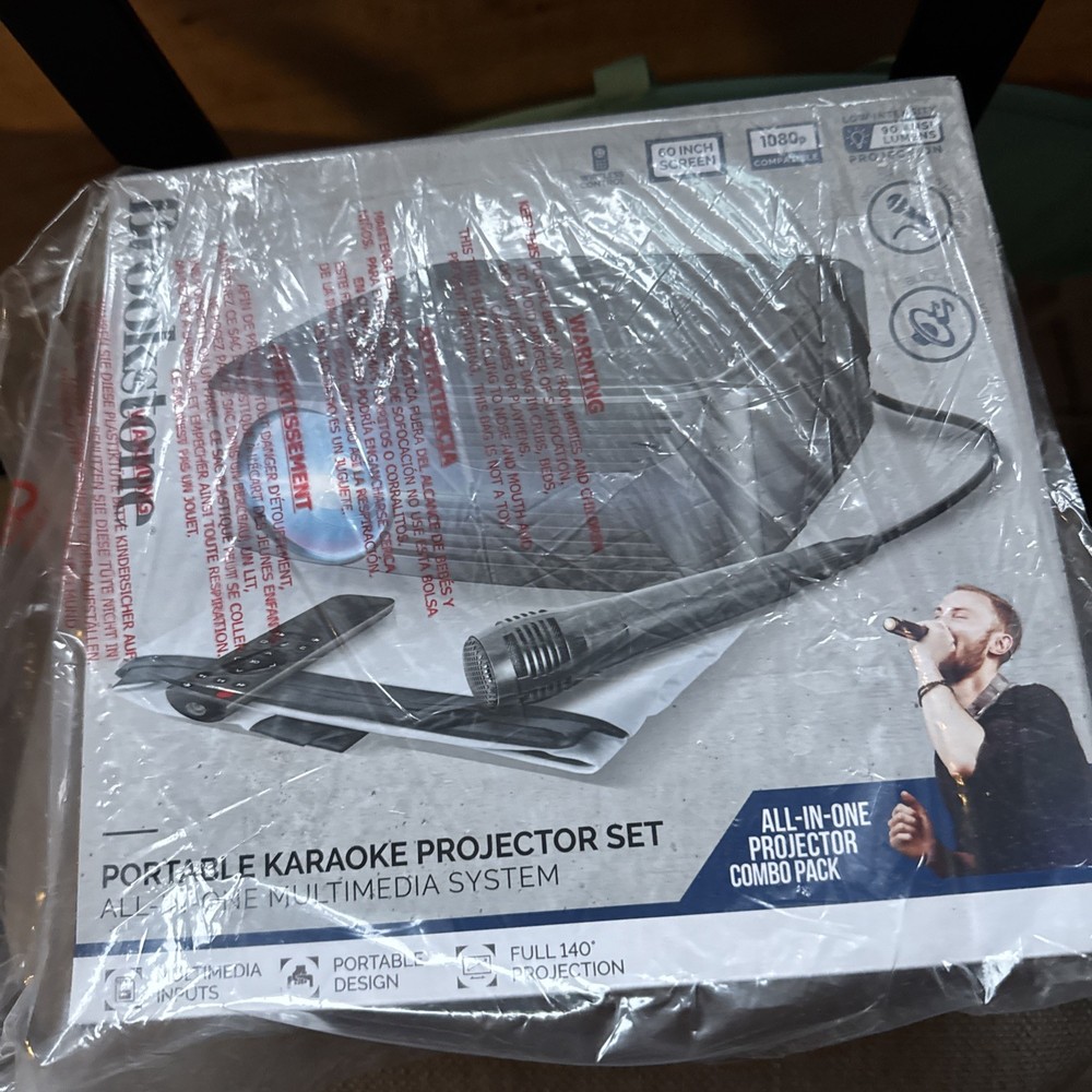 Brookstone Portable KARAOKE Projector Set Multimedia System Microphone Speaker