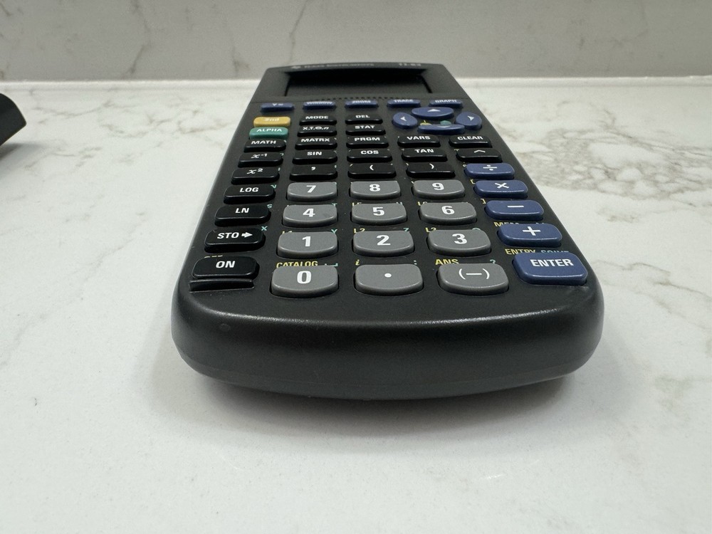 Texas Instruments TI-83 Handheld Graphing Calculator