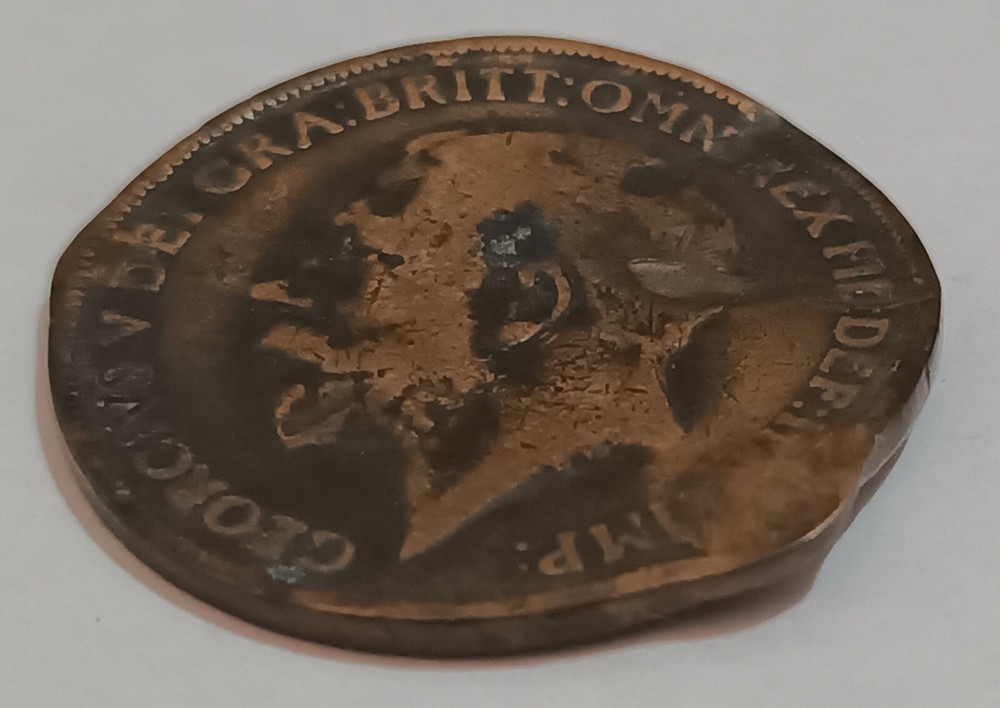 George V and George VI coins with error