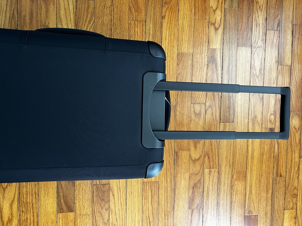 Away Softside flex carry on Expendable Luggage Black