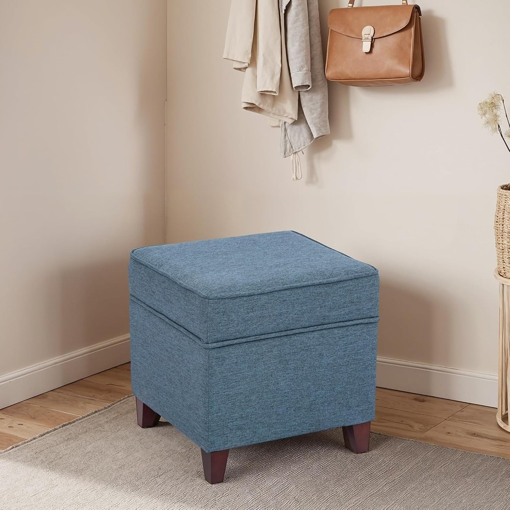 Blue storage bench with hinged lid and solid wood legs, linen-covered footstool