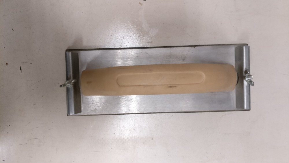 Eight assorted drywall/mud tools