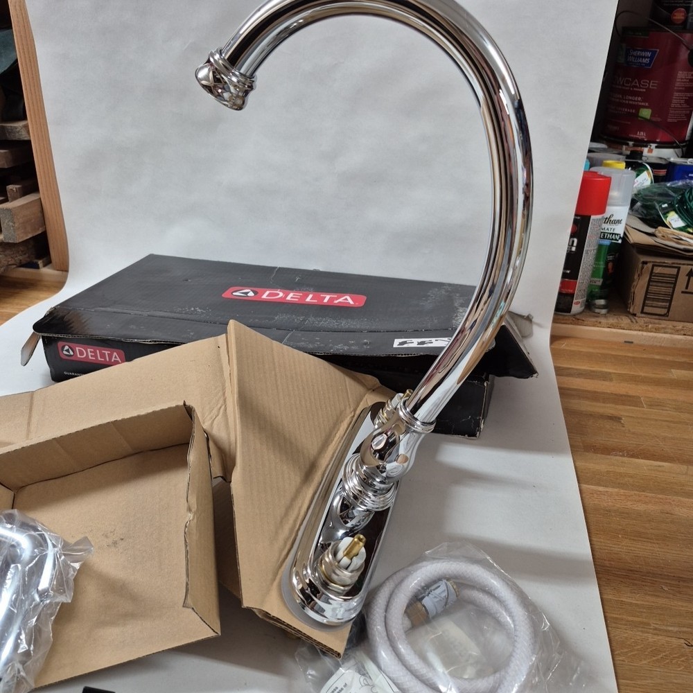 Delta Two Handle Kitchen Faucet With Veggie Spray 2457