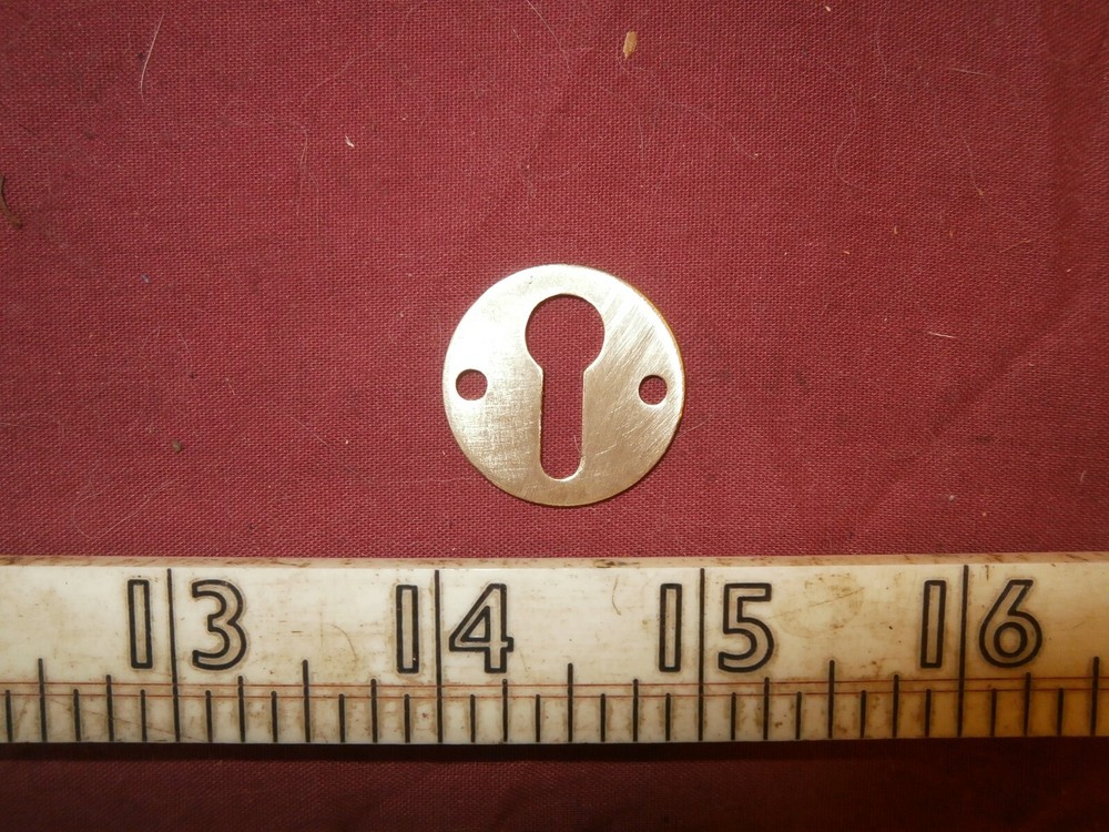 Vintage brass keyhole cover