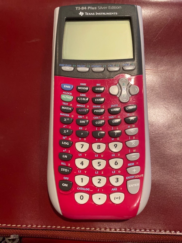 Tx Instruments TI-84 + Silver Edition Graphing Calculator, Pink/Grey. Preowned