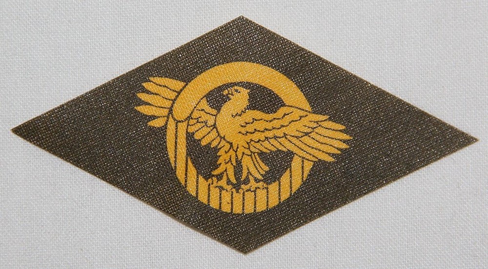 ORIGINAL, UNISSUED WWII "RUPTURED DUCK" DISCHARGE EAGLE