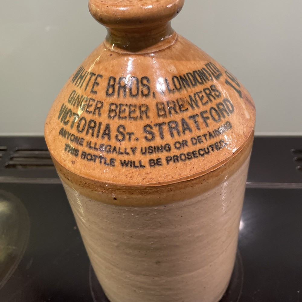 stoneware flagon. White Bros. Ginger Beer. Broken Handle