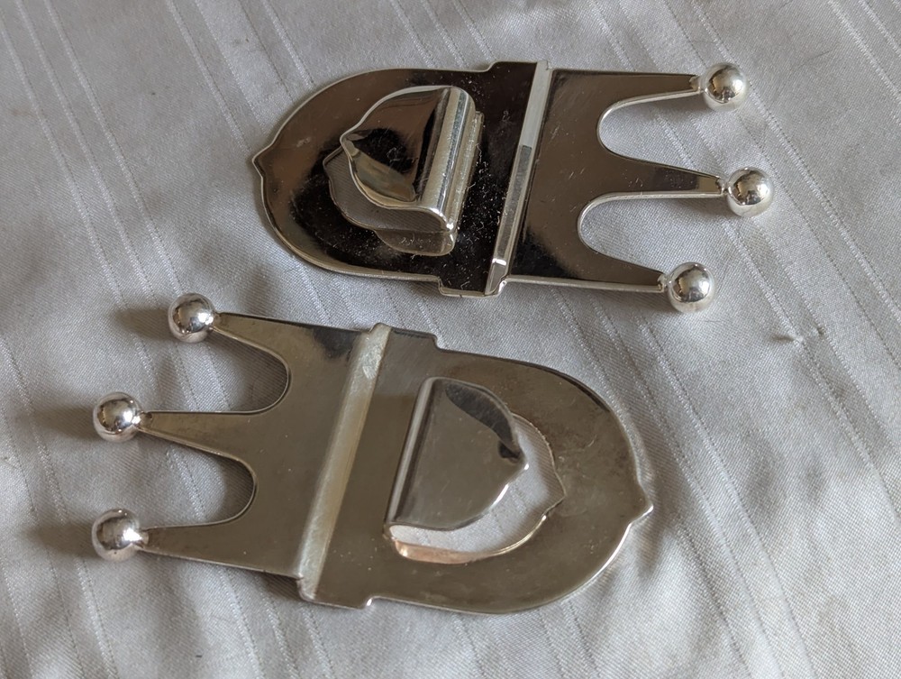 Neiman Marcus pair silver plated crown bottle openers