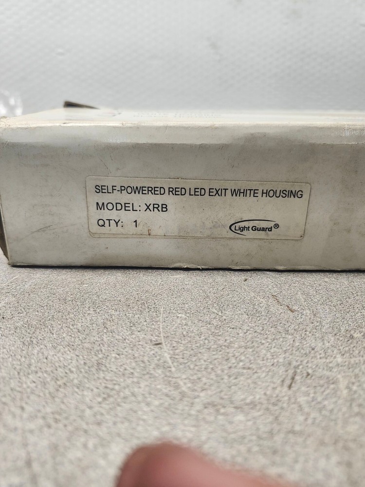 NEW IN BOX LIGHT GUARD SELF-POWERED RED LED EXIT WHITE HOUSING XRB