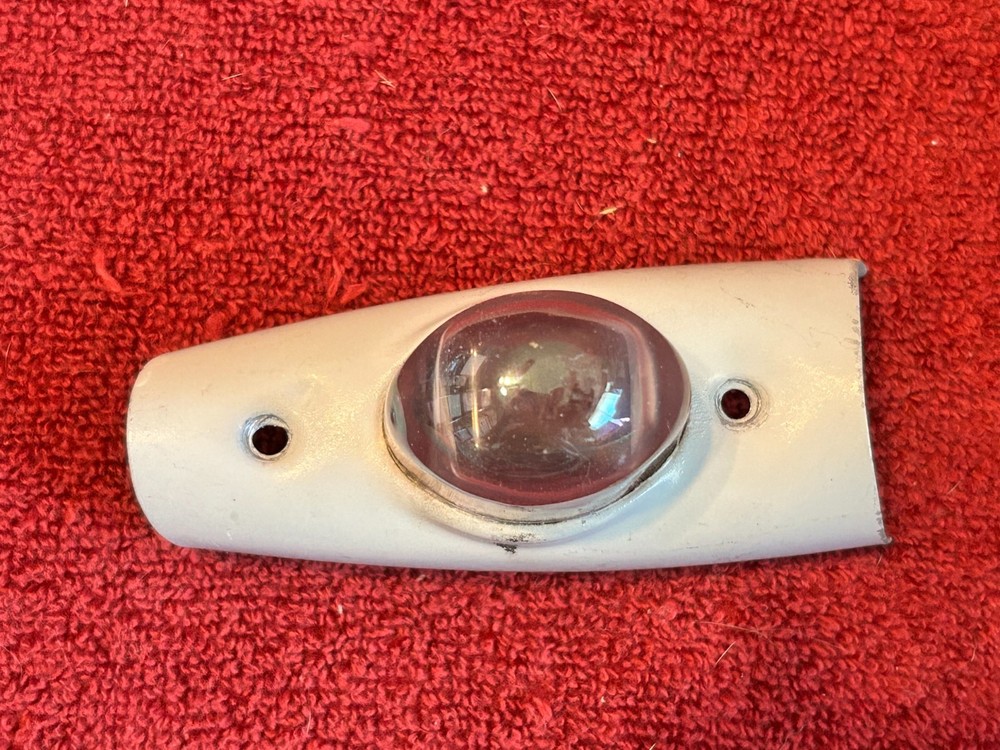 LENS AND SHIELD FOR AIRCRAFT NAVIGATION POSITION LIGHT