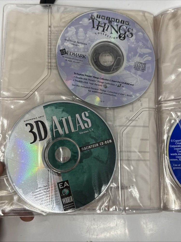 Vintage Macintosh 1990s CD-ROM Compact Discs Folder with 7 Discs