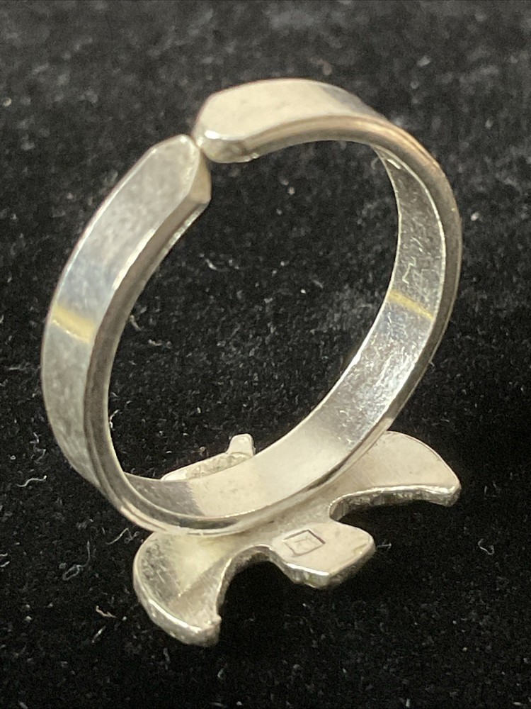An elegant and modern silver ring featuring the goddess, Isis. Adjustable