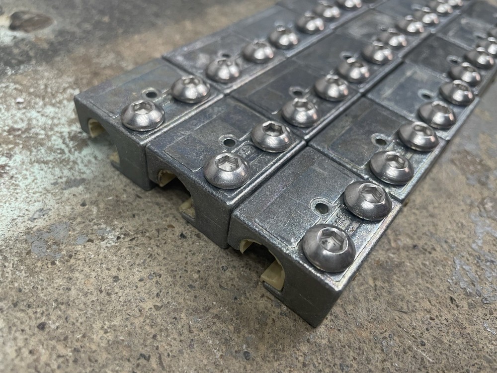 X18 Machine Rail Sliders with hardware for round rail, used