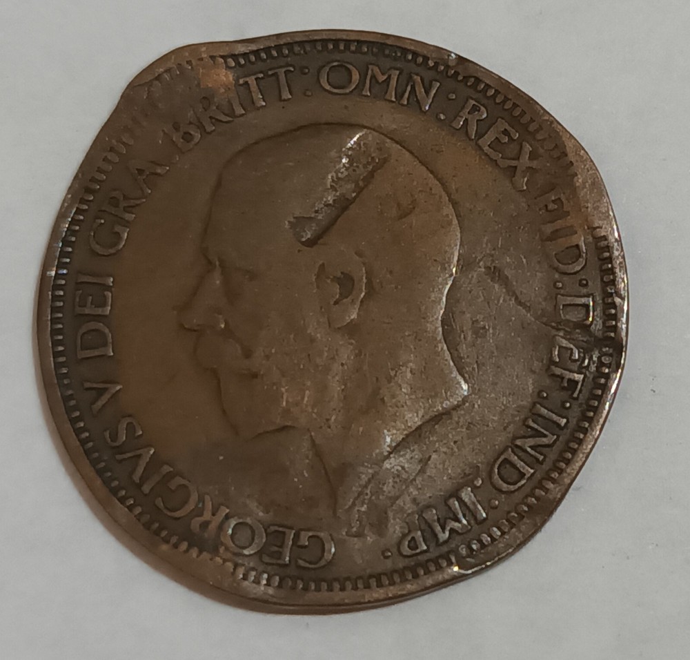 George V and George VI coins with error