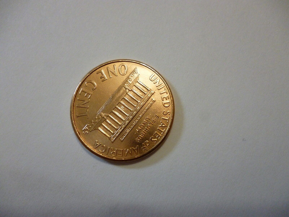 2000 penny, Floating roof coin