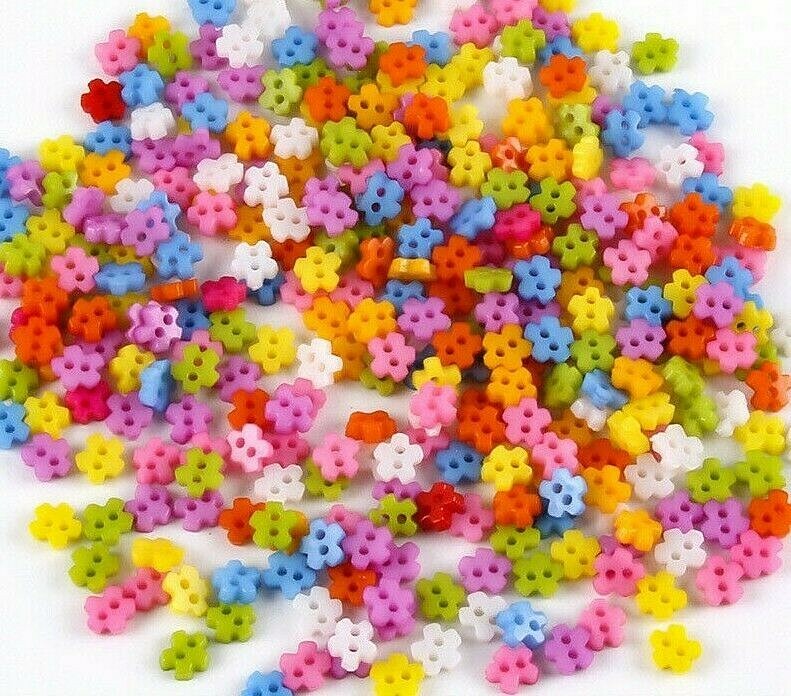 Pkg of TINY 1/4" (6mm) PLASTIC SNOWFLAKE Assorted Colors 2-hole Buttons (2139)