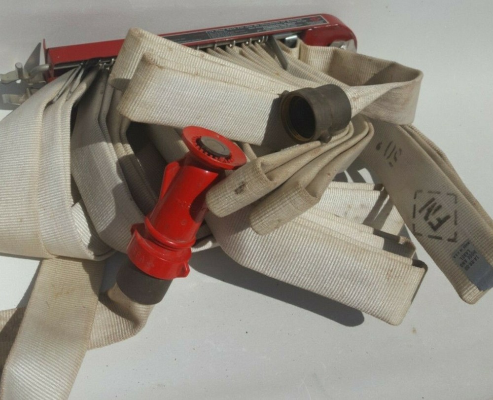 F-M Fireman Hose Rack with Fire Hose.