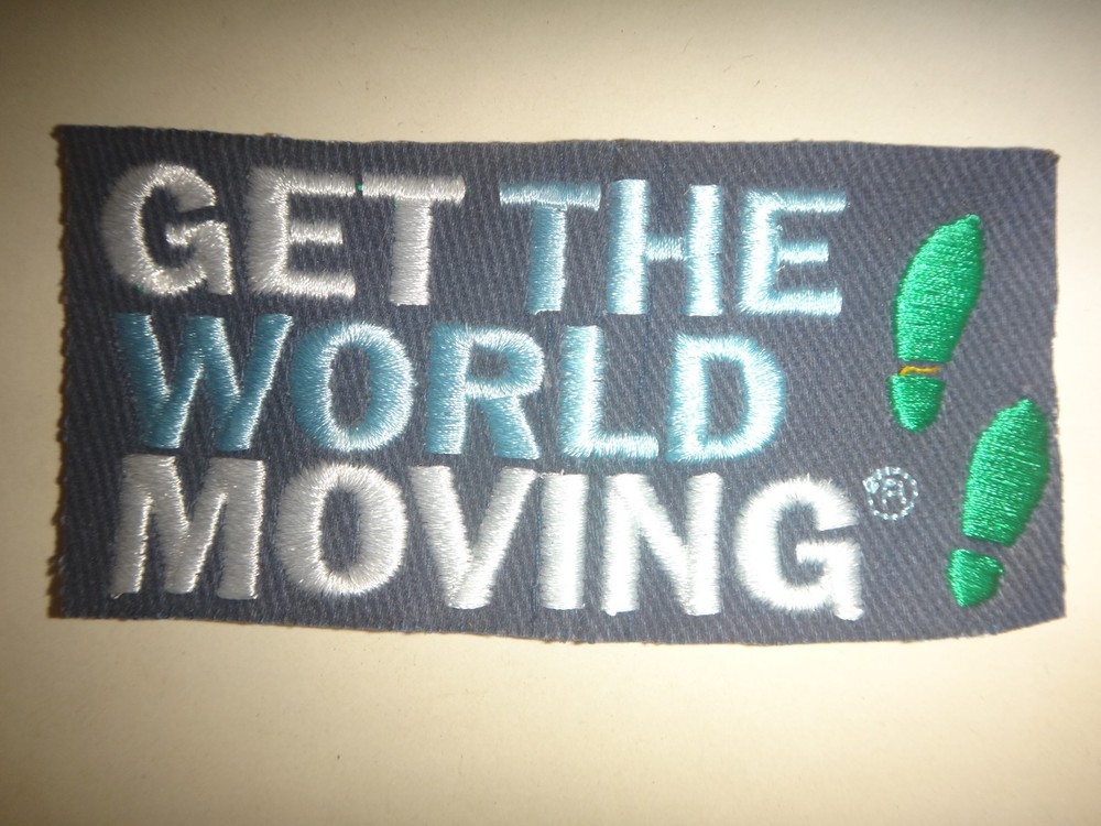Slogan GET THE WORLD MOVING Machine Embroidered Patch