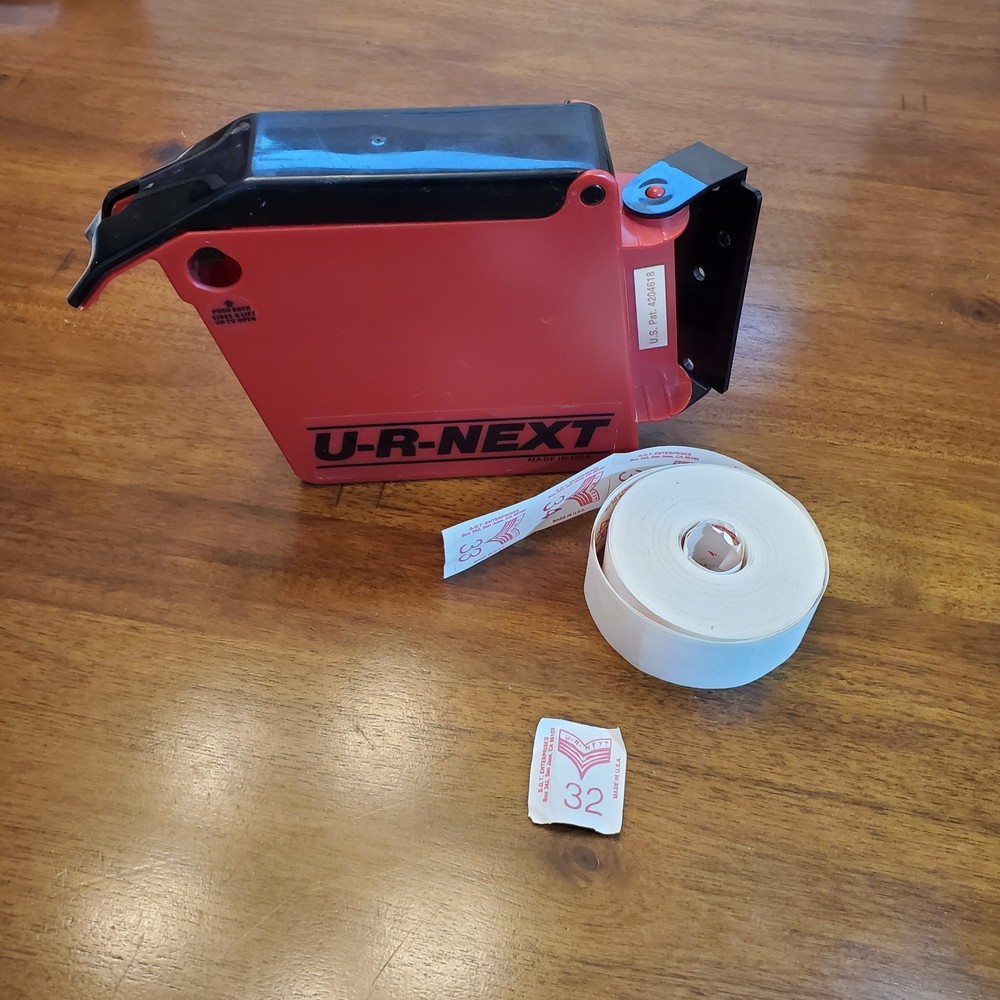 U R NEXT Ticket No. Dispenser with 1 partial Roll