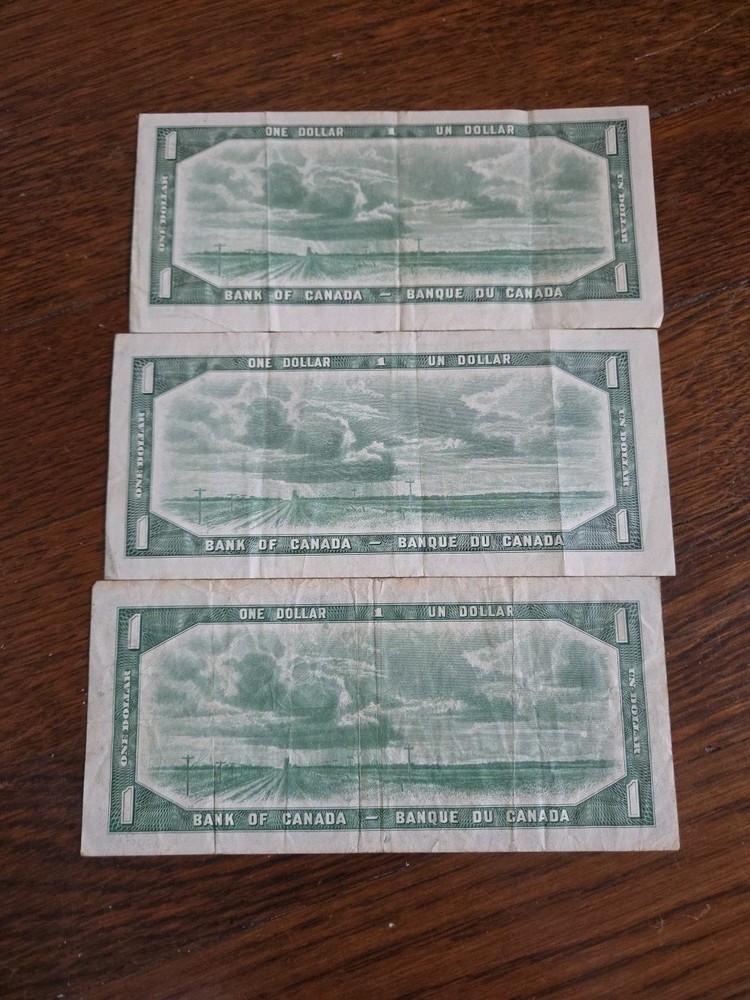 Three 1954 Canadian One Dollar Bills