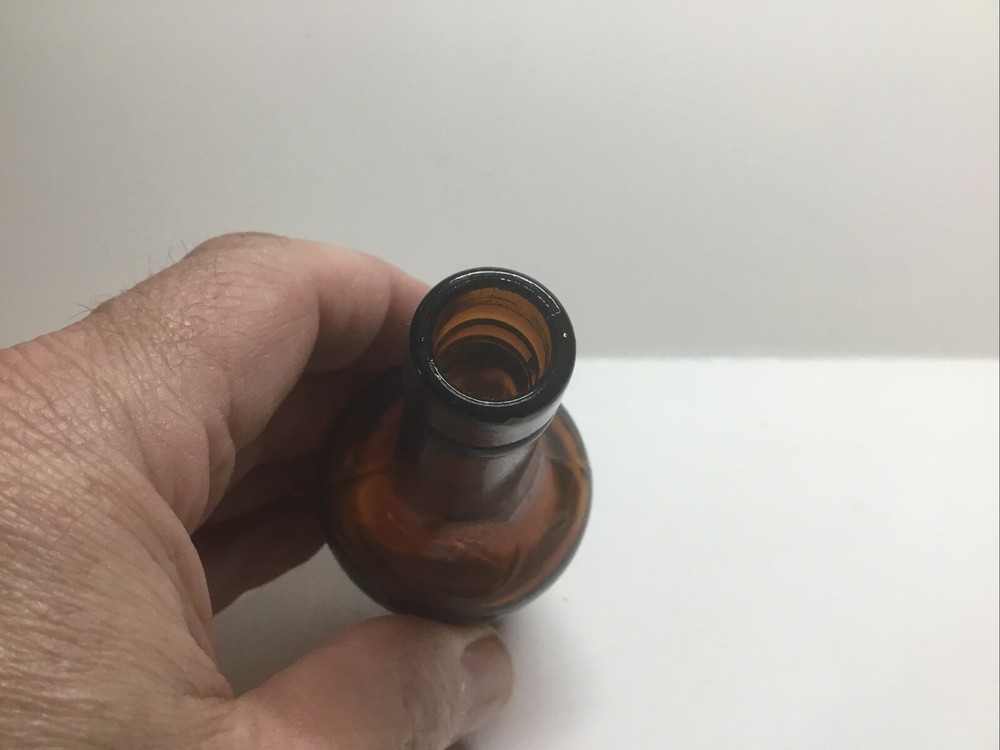 Small Squatty Antique Amber Sample Liquor Bottle.