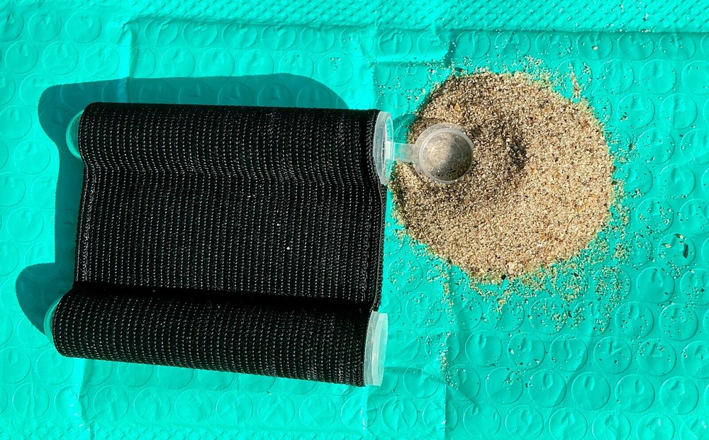 FLICK SAND - A TACTICAL SAND DISPENSER