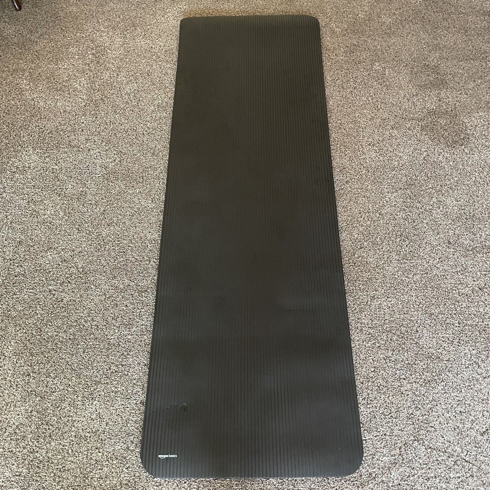 Amazon Basics 1/2-Inch Extra Thick Exercise Yoga Mat with Carrying Straps.