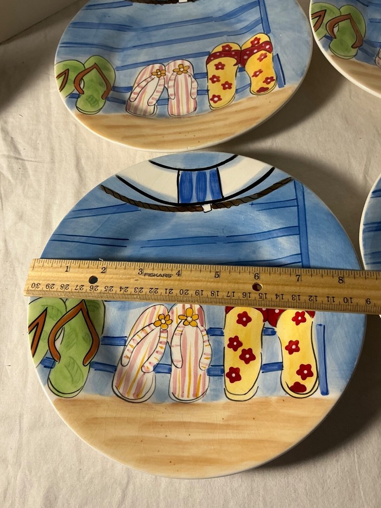 Stone life Four beach scene flip flops salad plates