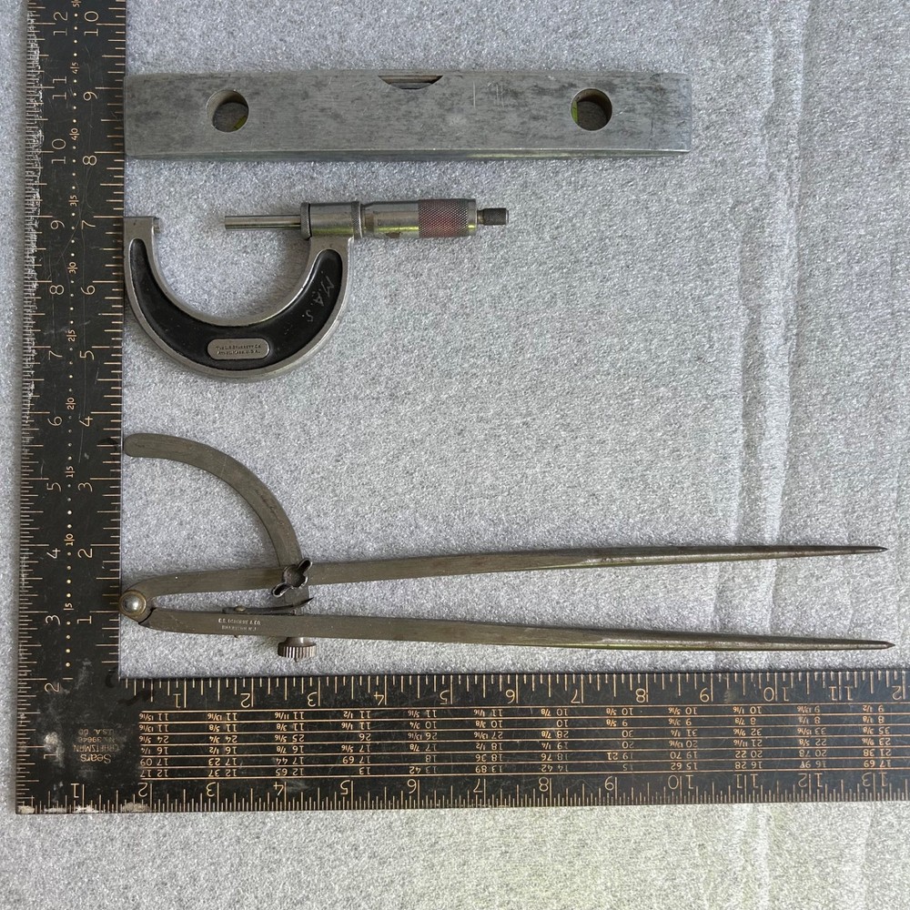 Vintage level, 2” micrometer, and divider caliper
