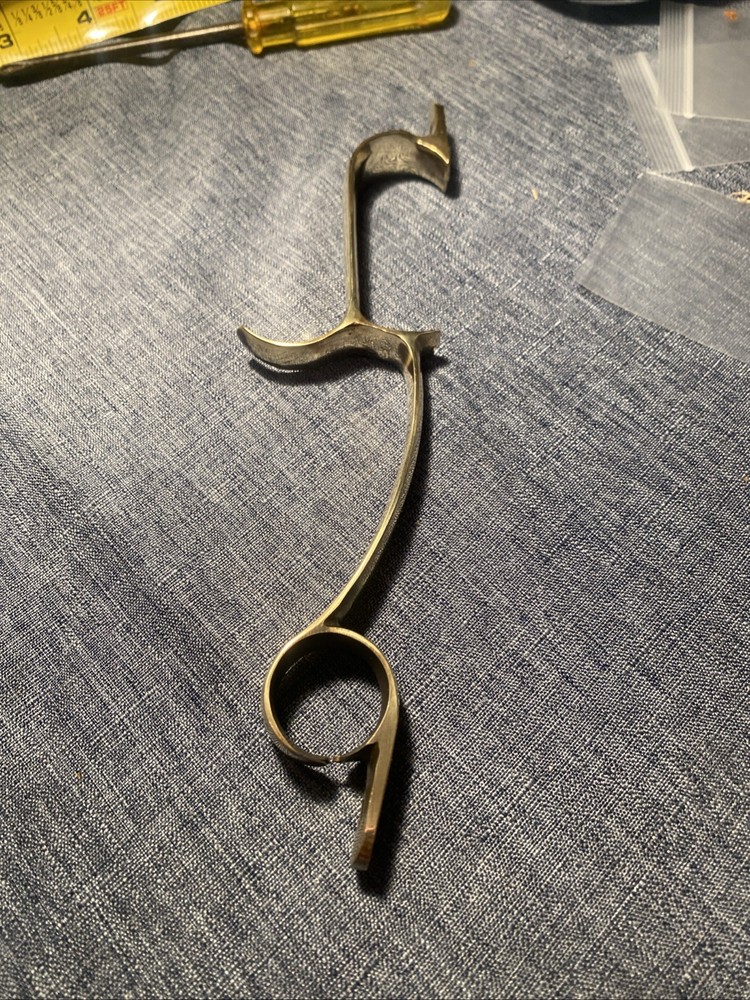 Brass Trigger Guard from a CVA Hawkins Muzzleloader With Screws.