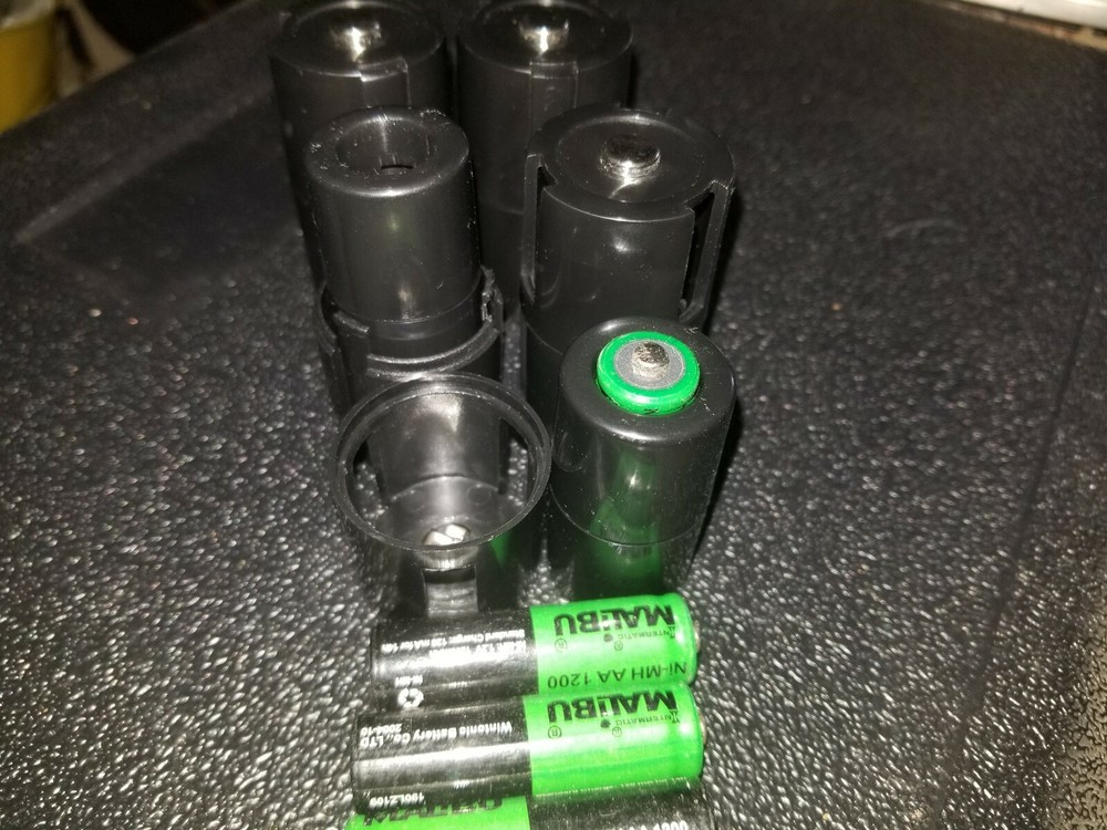 Nested D And C Sized Adapters For AA Batteries  quantity is 4 sets