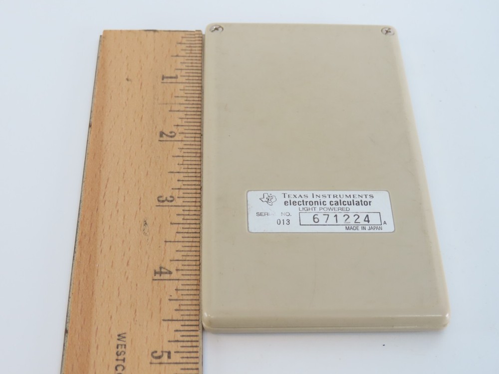 Lot of 2 Texas Instruments TI-1006 Light Powered Calculators Working