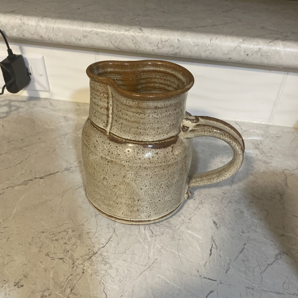 Heavy Pottery Pitcher. Signed By Maker. With Iris Flowers.