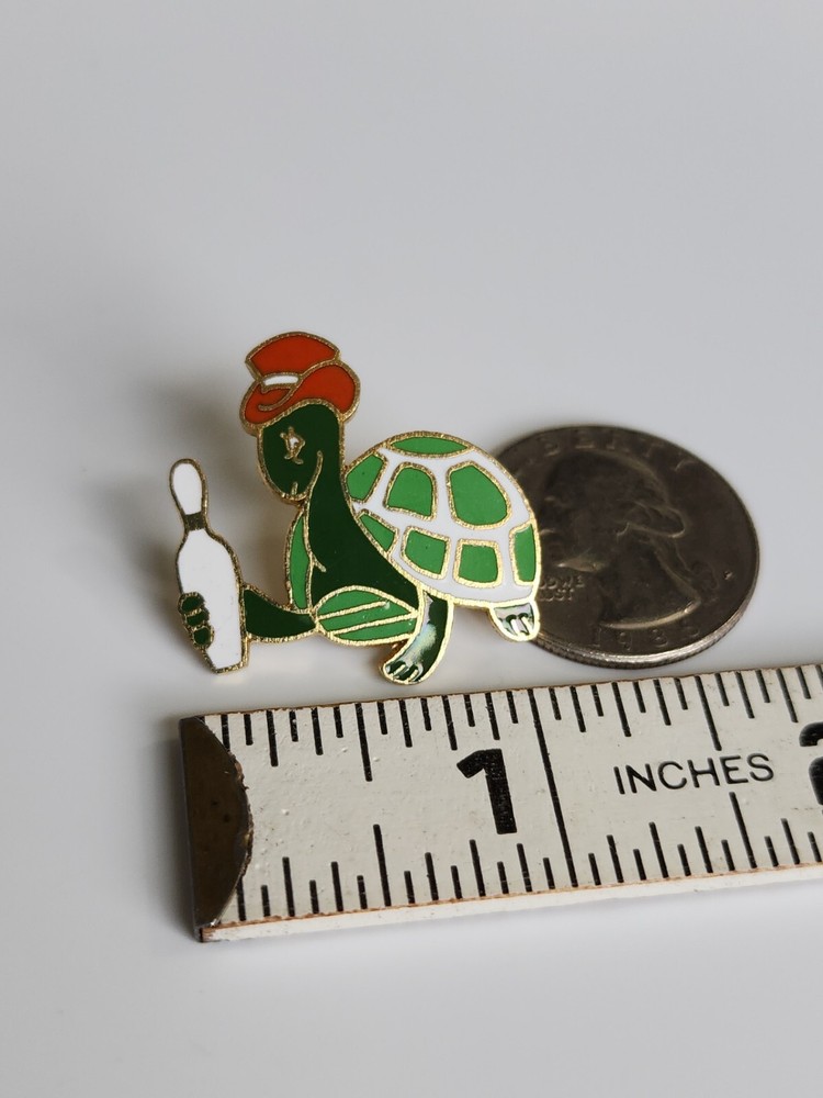 Turtle in Orange Hat Holding Bowling Pin Lapel Pin