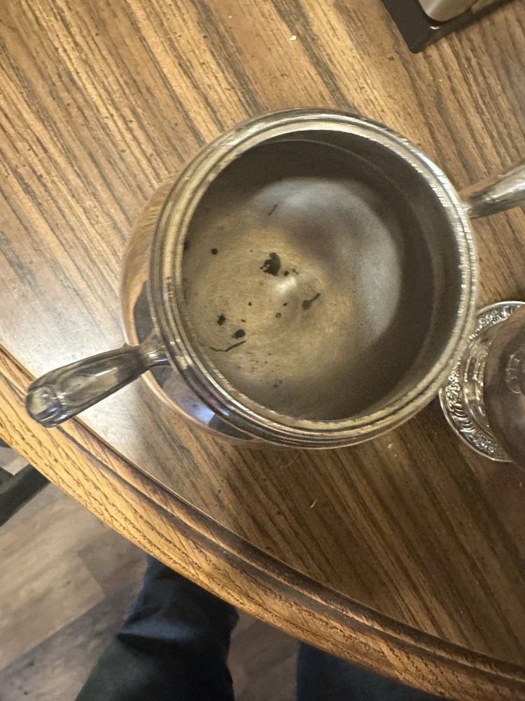 Set Of Four Silver Plated Cups.