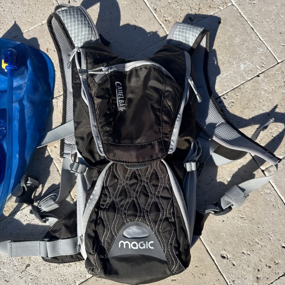 Black CAMELBAK magic Hydration Back Pack w/ Blue 2 Liter/70oz Bladder XV