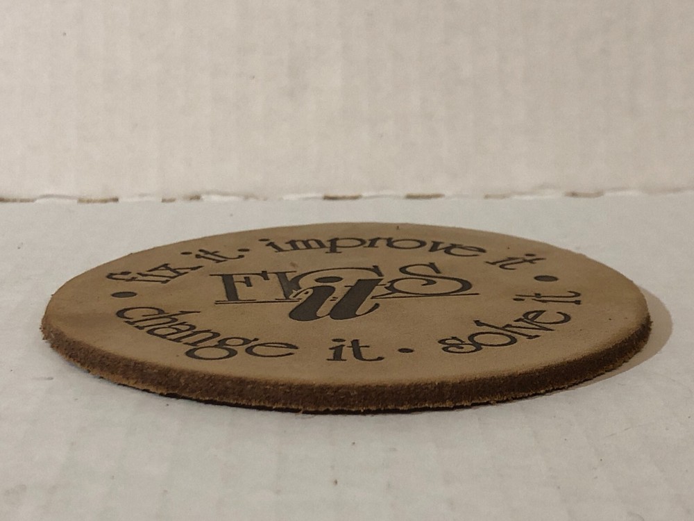 Fics It Brown Cork Round Shape Fix It. Improve It. Change It. Solve It. Coaster