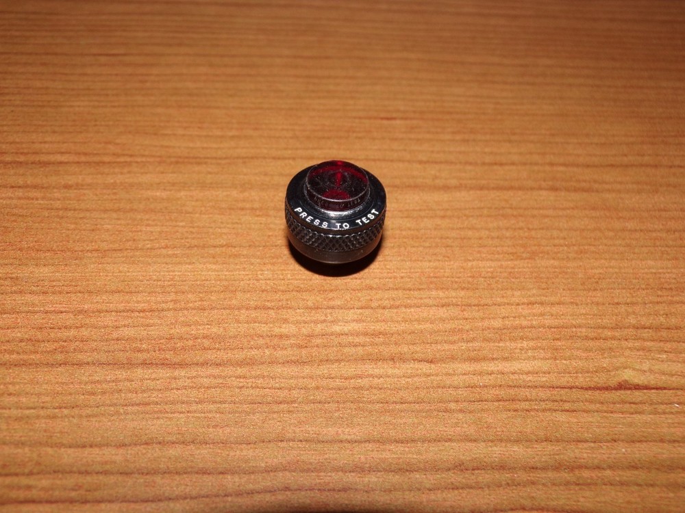 Red Press To Test Cap