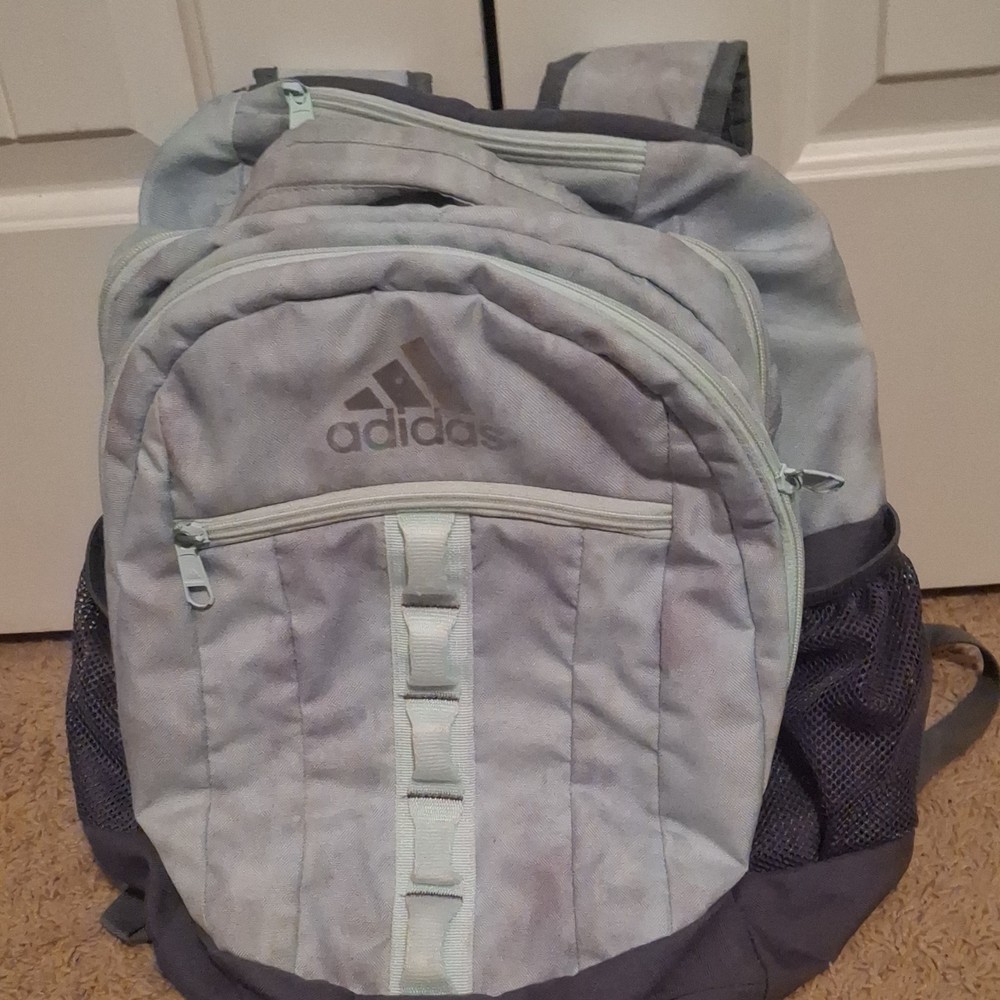 Adidas light blue with pink splash design Backpack 5 Pockets.
