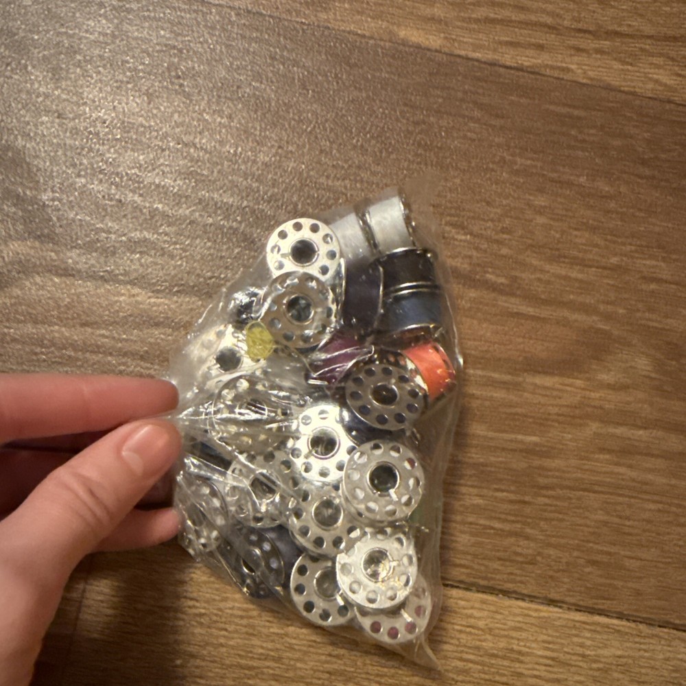 Lot Of Threaded Sewing Machine Bobbins