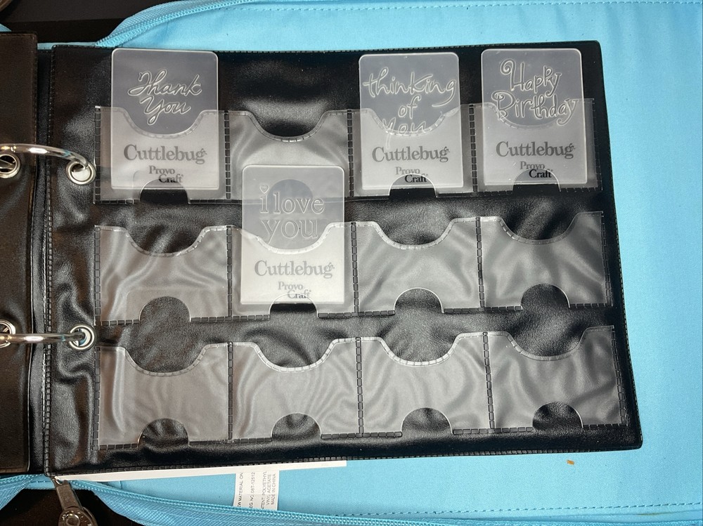 Cuttlebug Embossing Storage Binder Zip w Asst 50 Embosser/Dies ‘A’ Spacer *READ*