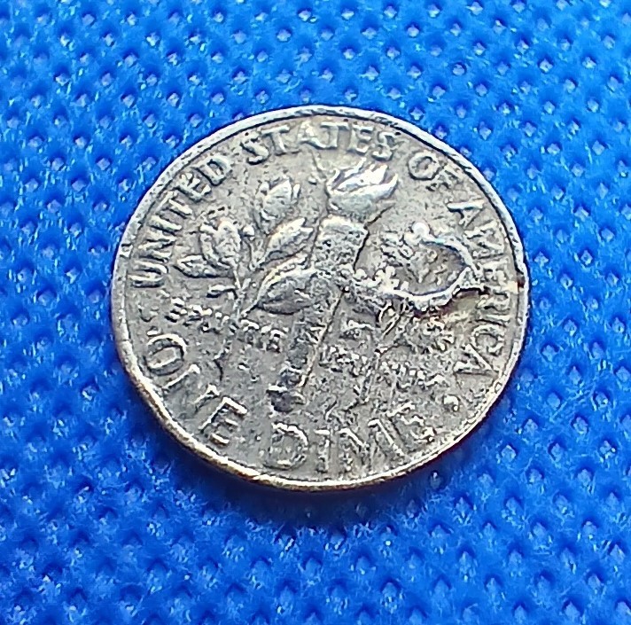 1 - 1986P Roosevelt Dime. Features various errors front and back.