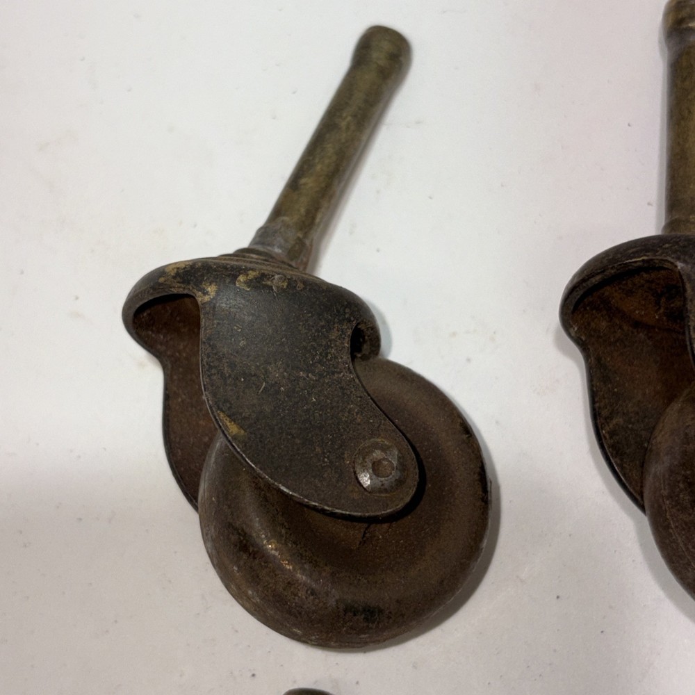 4 Vintage Matching Metal Caster Wheels