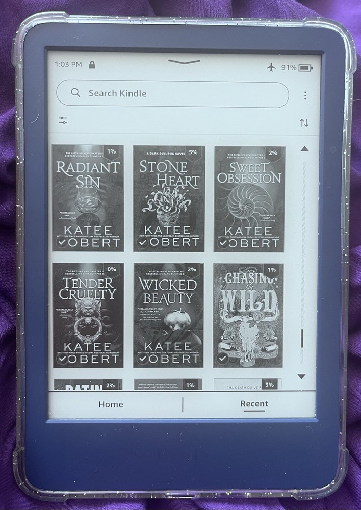 Amazon Kindle ereader Blue with books