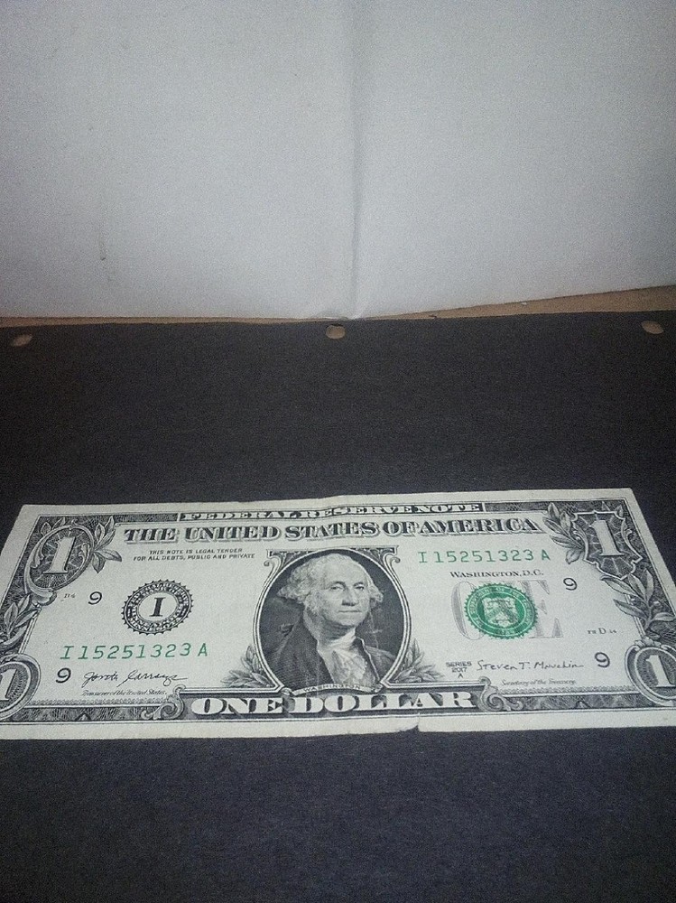 ERROR 1 DOLLAR BILLS, SLIGHT TEAR SEE PHOTO