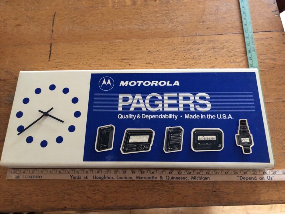 Vintage Motorola clock sign